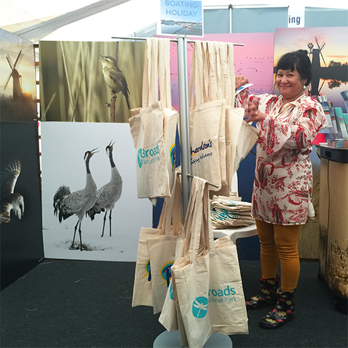 Bag stand with poster holder